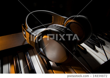 Piano with headphones 14834872