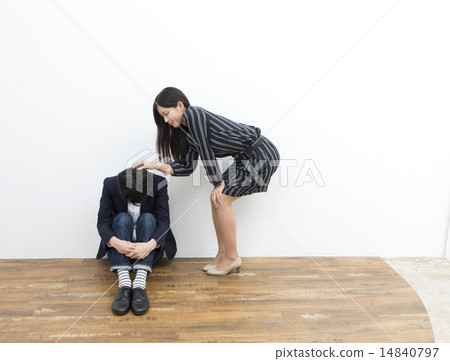 A woman comforting a messy man 14840797