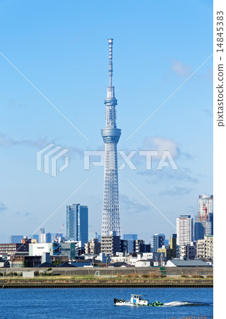 The Tokyo sky tree spreads with blue skies from Arawa River's river 14845383