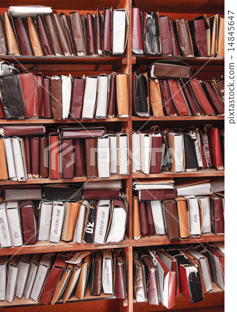 Paper documents stacked in archive Paper documents stacked in archive 14845647