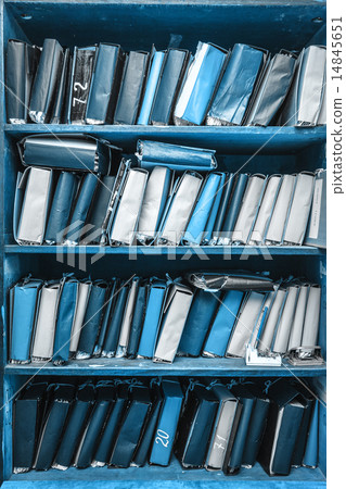 Paper documents stacked in archive Paper documents stacked in archive 14845651