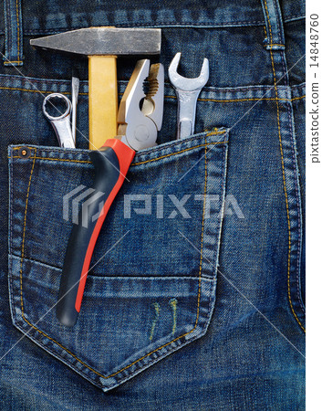 Instruments in a back pocket of a jeans 14848760