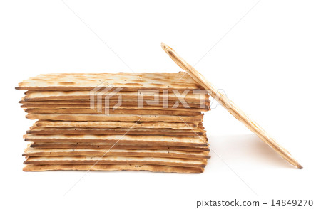 Pile of machine made matza flatbread 14849270