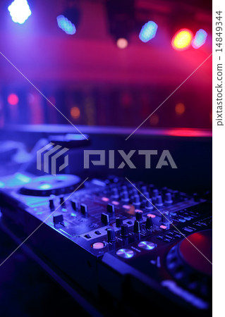 DJ mixer with light colored spotlights discos 14849344