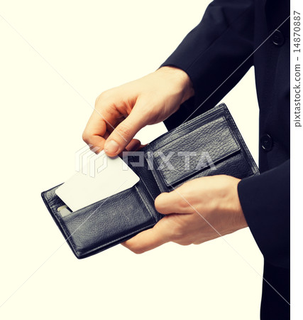 man in suit holding credit card man in suit holding credit card 14870887