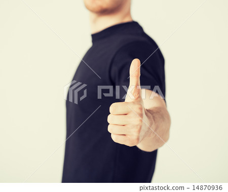 man showing thumbs up man showing thumbs up 14870936