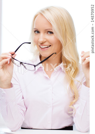 smiling businesswoman or secretary in office smiling businesswoman or secretary in office 14870952