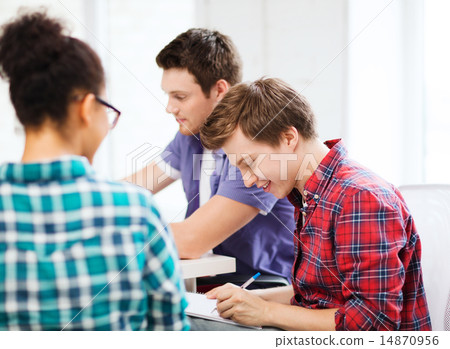 student with notebook studying at school 14870956
