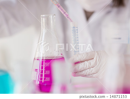 close up of scientist making test in lab close up of scientist making test in lab 14871153
