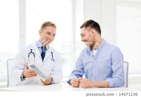 doctor with tablet pc and patient in hospital doctor with tablet pc and patient in hospital 14871236