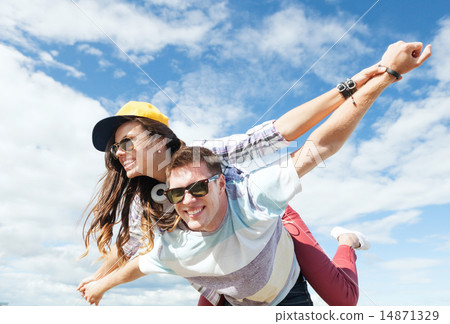 teenagers having fun outside 14871329