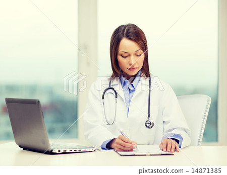 busy doctor with laptop computer and clipboard busy doctor with laptop computer and clipboard 14871385