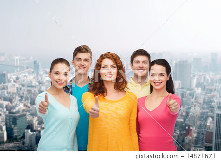 group of smiling teenagers over city background group of smiling teenagers over city background 14871671