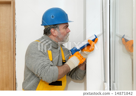 Home renovation, caulking with silicone 14871842