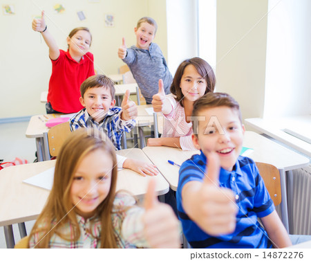 group of school kids showing thumbs up group of school kids showing thumbs up 14872276