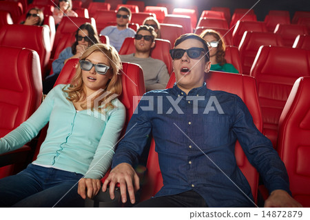 friends watching horror movie in 3d theater 14872879
