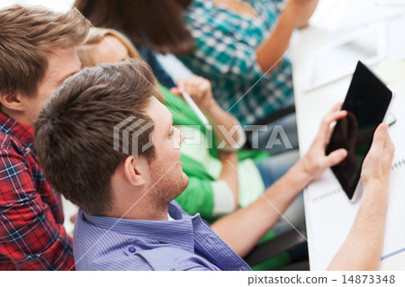 students looking at tablet pc at school students looking at tablet pc at school 14873348
