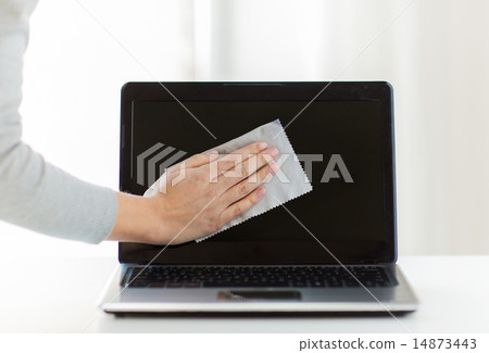 close up of woman hand cleaning laptop screen close up of woman hand cleaning laptop screen 14873443