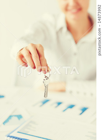 woman hand holding house keys 14873992