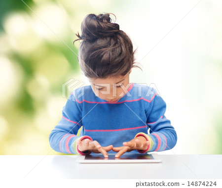 little girl with tablet pc over green background little girl with tablet pc over green background 14874224