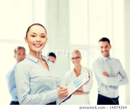 young smiling businesswoman with clipboard and pen young smiling businesswoman with clipboard and pen 14874264