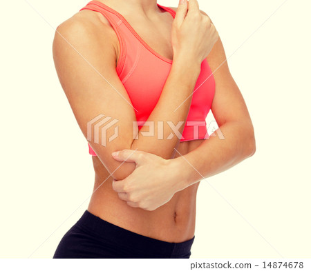 sporty woman with pain in elbow sporty woman with pain in elbow 14874678