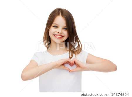 smiling little girl showing heart with hands 14874864