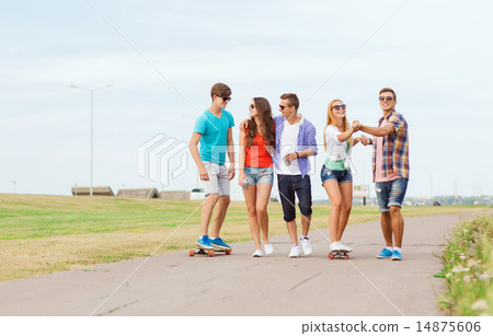 group of smiling teenagers with skateboards group of smiling teenagers with skateboards 14875606