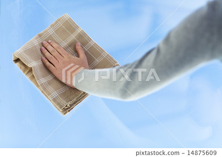 close up of woman hand cleaning window with cloth 14875609