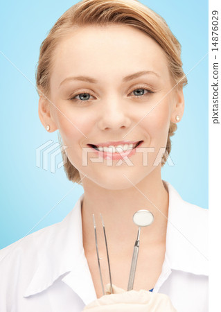 happy young female dentist with tools 14876029