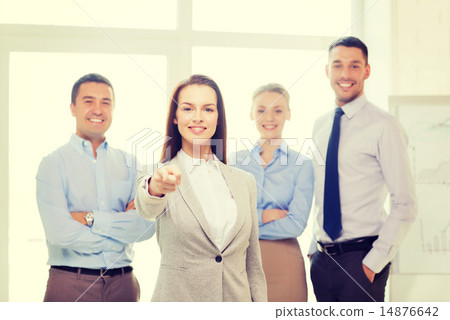 businesswoman in office pointing finger at you businesswoman in office pointing finger at you 14876642