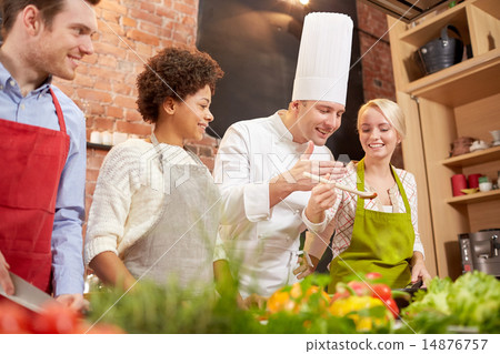 happy friends and chef cook cooking in kitchen happy friends and chef cook cooking in kitchen 14876757