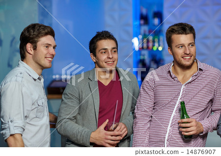 group of male friends with beer in nightclub group of male friends with beer in nightclub 14876907