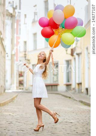woman with colorful balloons 14877107