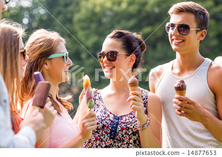 group of smiling friends with ice cream outdoors group of smiling friends with ice cream outdoors 14877653
