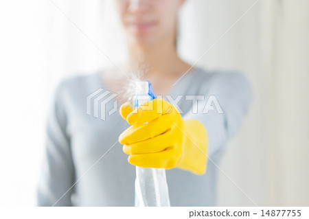 close up of happy woman with cleanser spraying close up of happy woman with cleanser spraying 14877755
