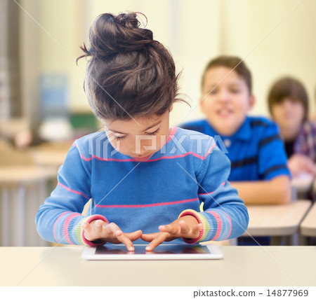 little school girl with tablet pc over classroom little school girl with tablet pc over classroom 14877969