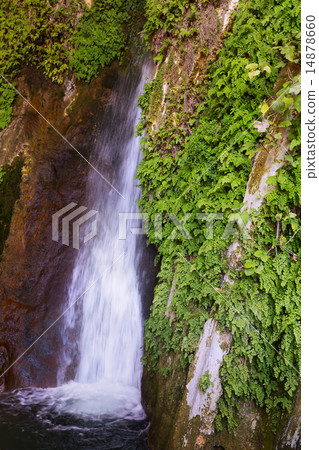 Waterfall in rock 14878660