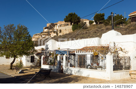 District with dwellings caves built into rock. Chinchilla 14878907