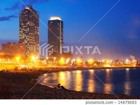 Beach and towers of Port Olimpic in twilight. Barcelona 14879083
