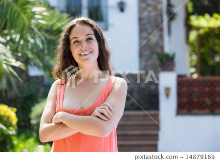 Woman against house 14879169