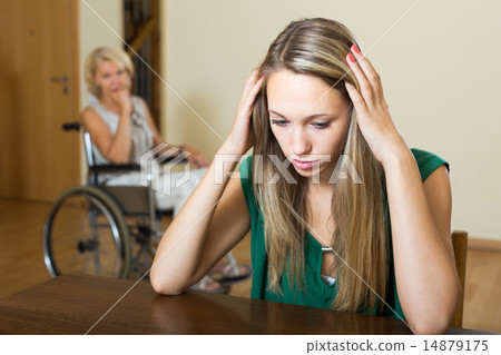 Woman and handicapped female having quarrel Woman and handicapped female having quarrel 14879175