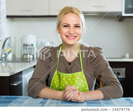 Portrait of woman at kitchen 14879778