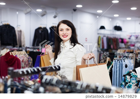 Young female buyer at clothing store 14879829