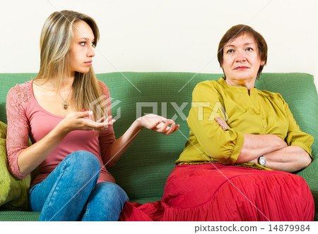 daughter and mother arguing about something 14879984