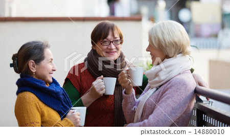 Women having tea on terrace 14880010