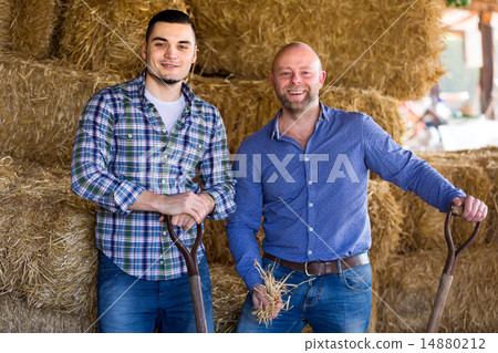 Two farmers in a shed Two farmers in a shed 14880212