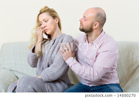 Man tries reconcile with woman Man tries reconcile with woman 14880270