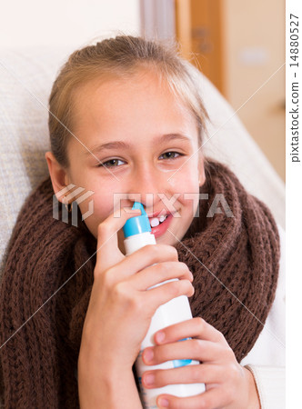 Sick child with nasal spray 14880527