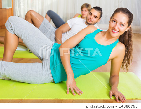 Young people working in gym 14880763